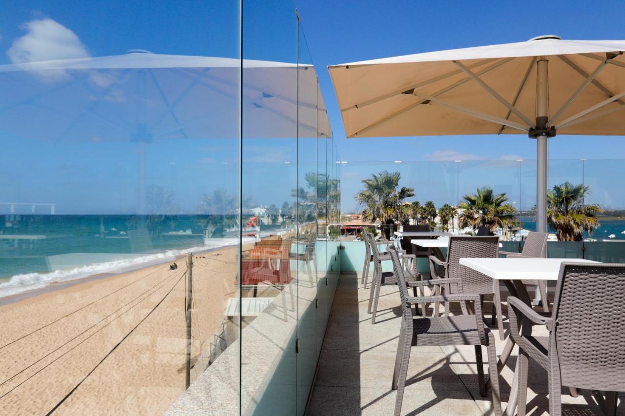 Golden Beach Guest House & Rooftop Bar ฟารู ภายนอก รูปภาพ